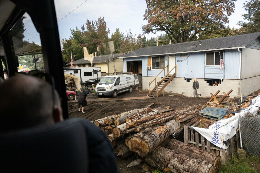 A home in the Basin and homeowner discussing renovations to raise the home. 